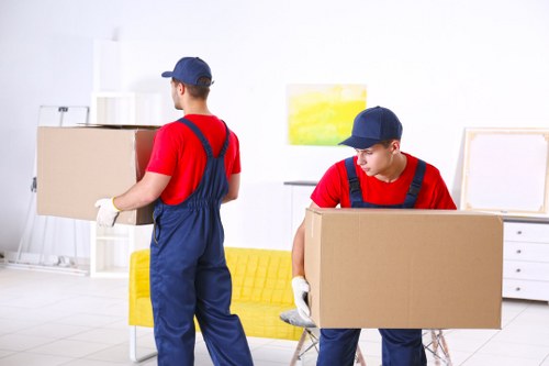 Boxes and furniture being prepared for transparent self storage pricing in Haringey