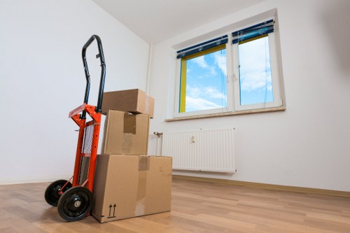A mobile self storage container being loaded for a home move in Haringey